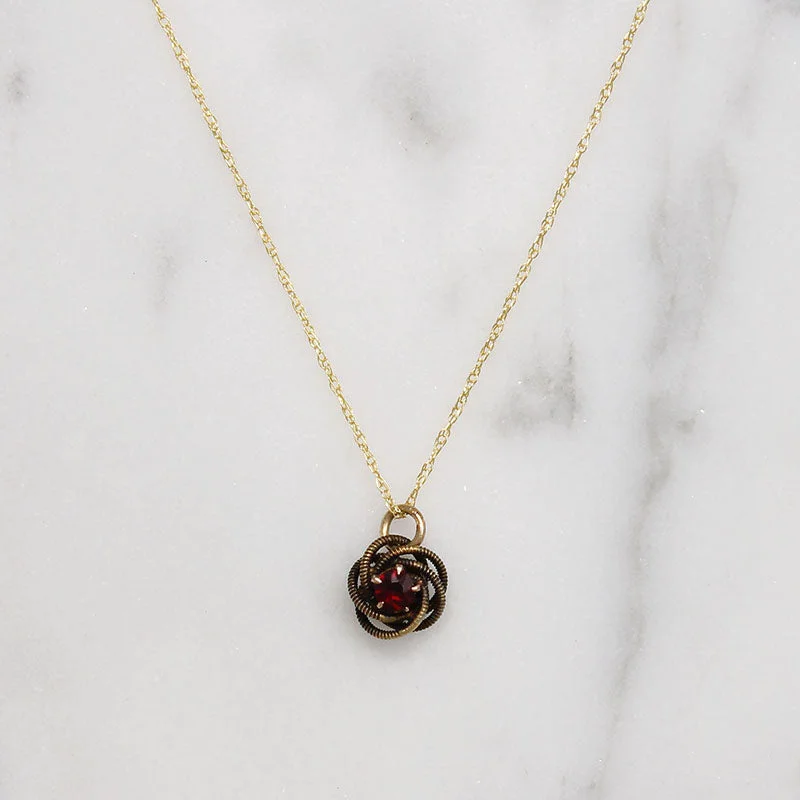 Dainty Diamond Necklace For Elegant Look-Engraved Gold & Garnet Wee Love Knot Necklace